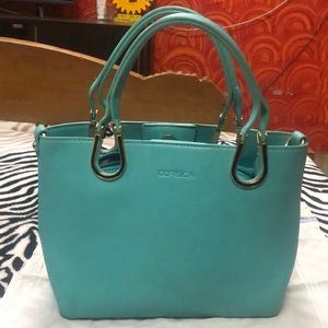 Corsica handbag in ferozi green colour